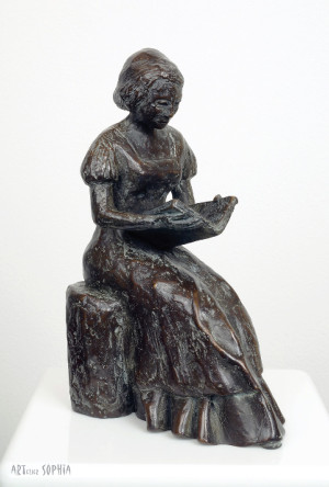 Bronzen beeld ''Lezende Vrouw''